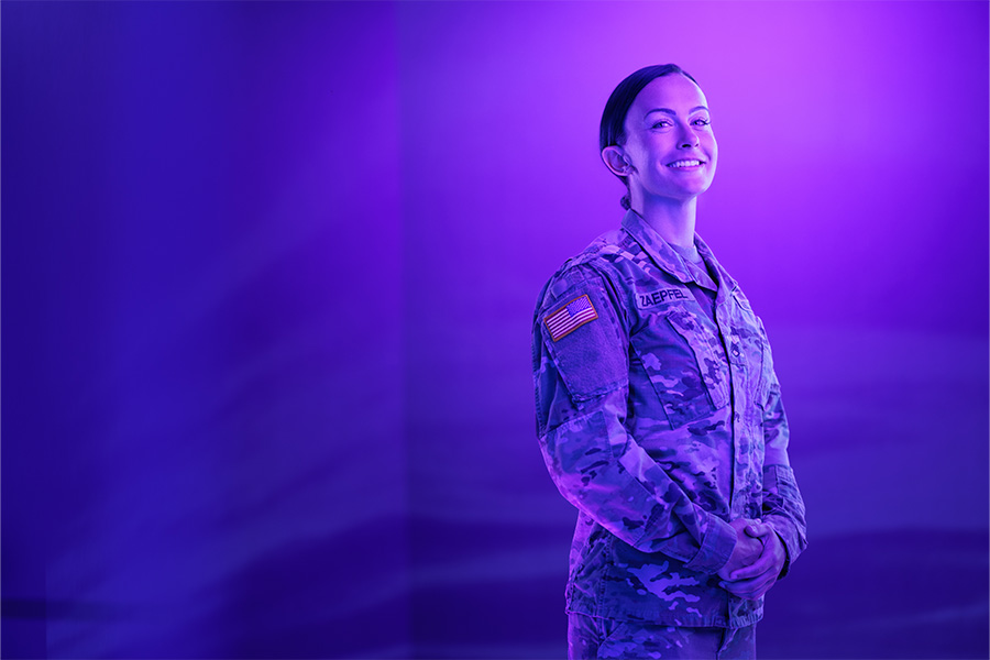 A person dressed in military camouflage.